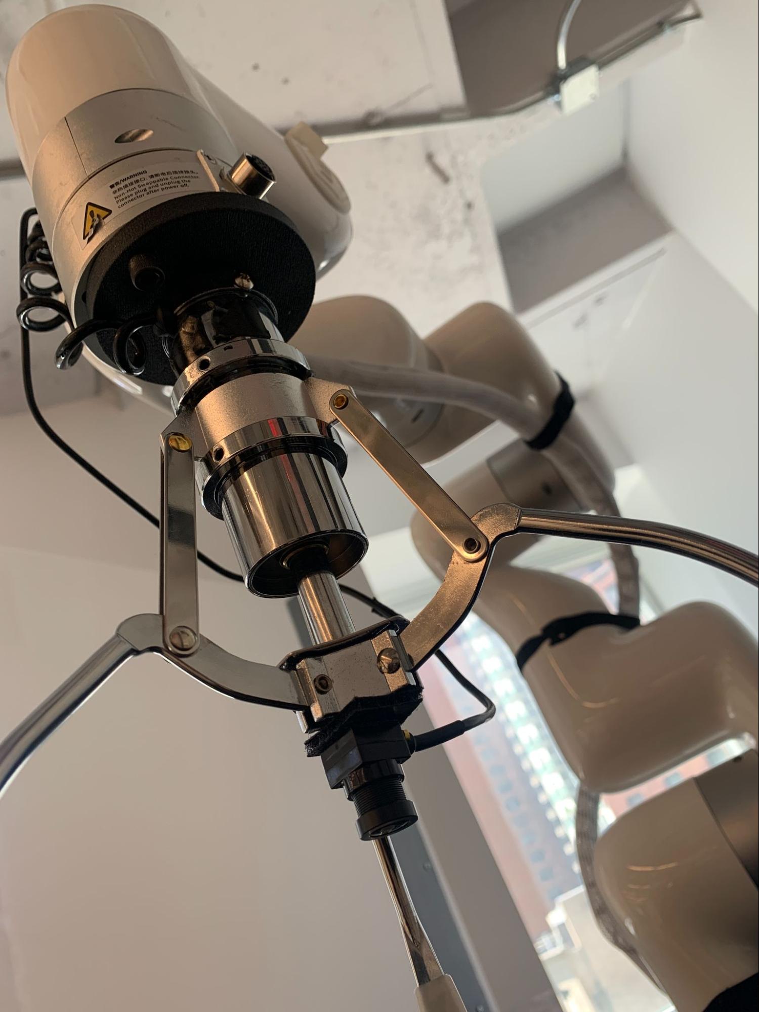 3d printed mount attached to the gripper and mounted to the arm